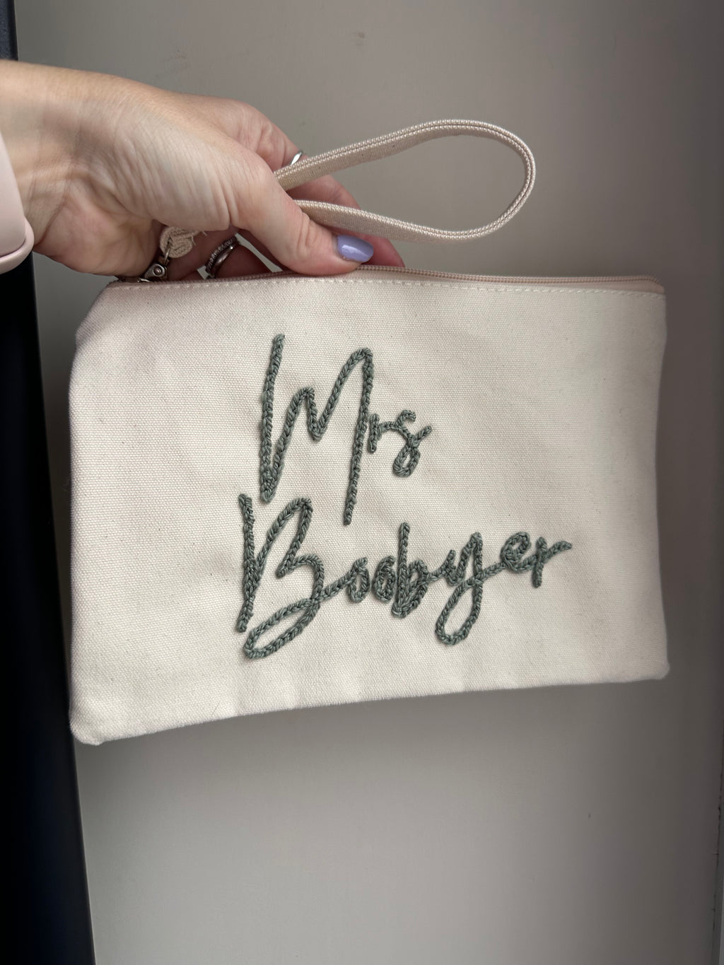 Personalised wristlet pouch