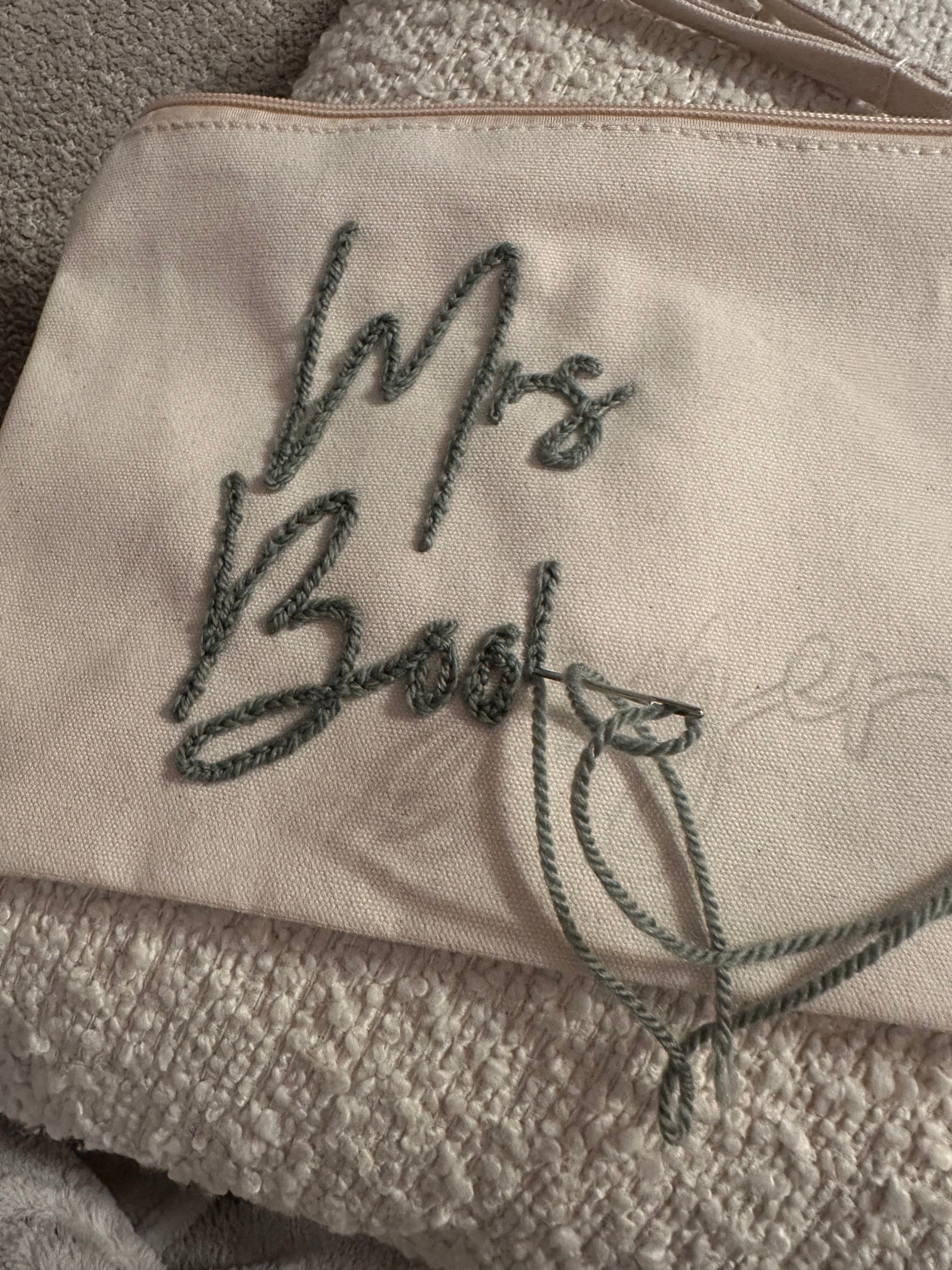 Personalised wristlet pouch