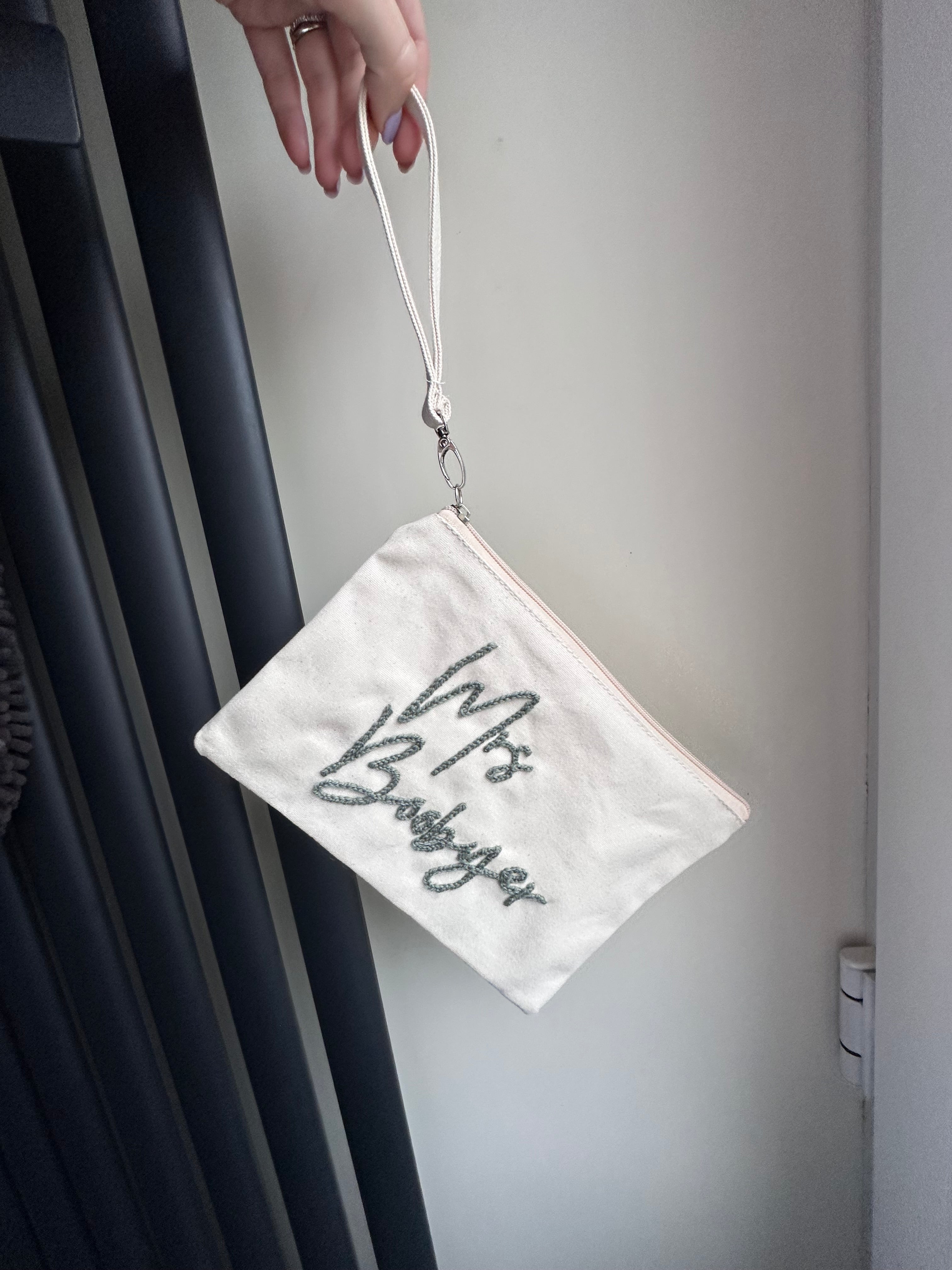 Personalised wristlet pouch