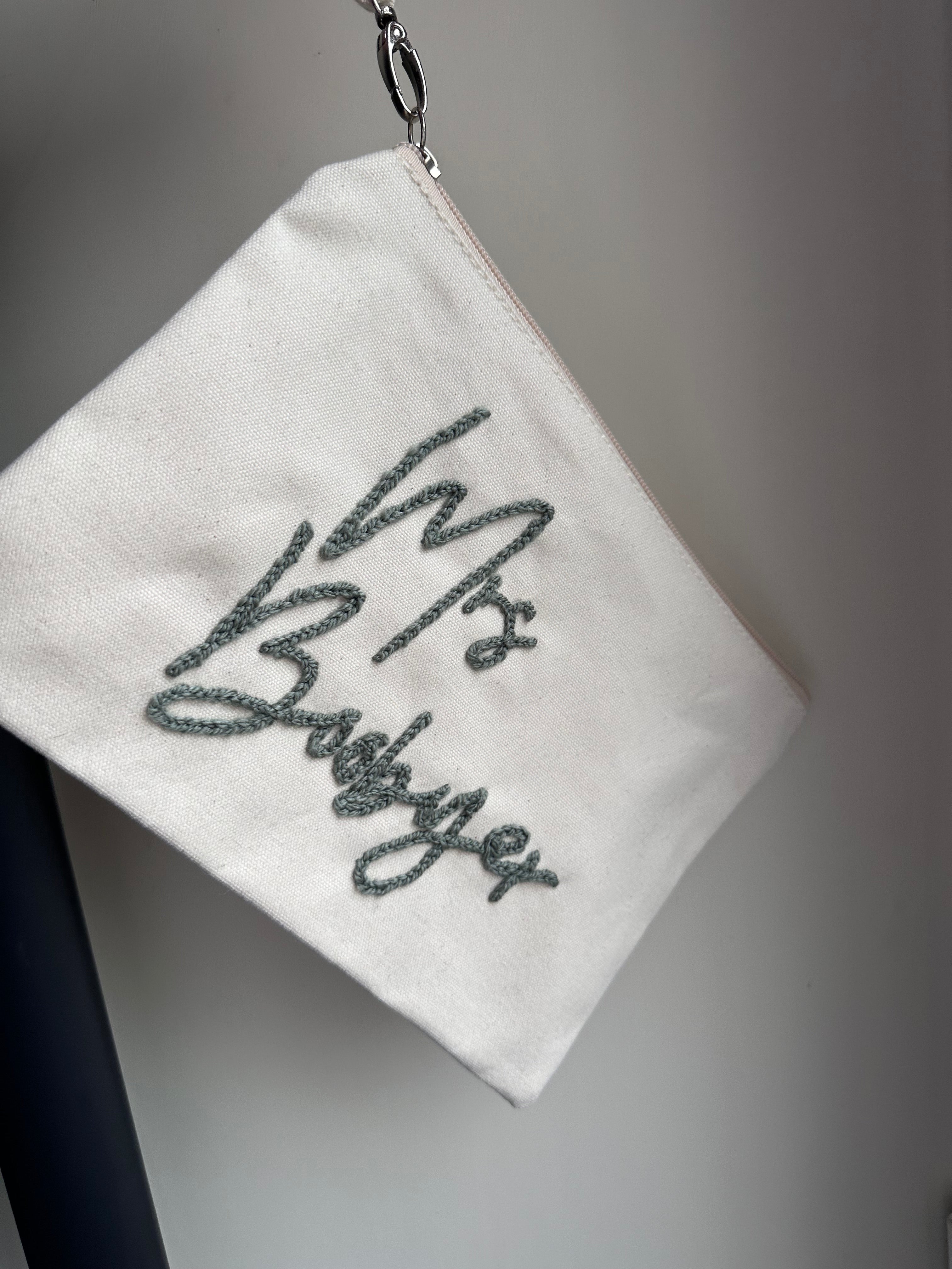 Personalised wristlet pouch